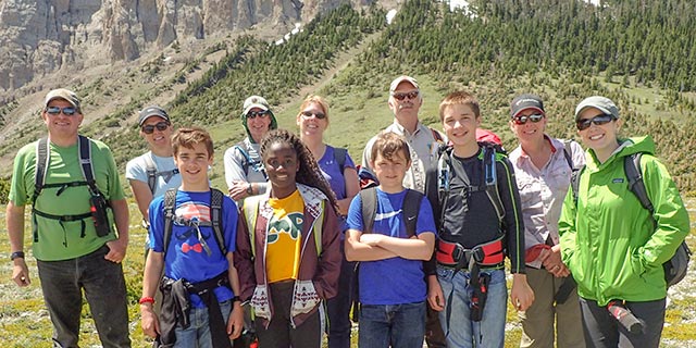 Get involved on National Trails Day and hit the trail. This diverse group poses for a picture during a group hike in Montana